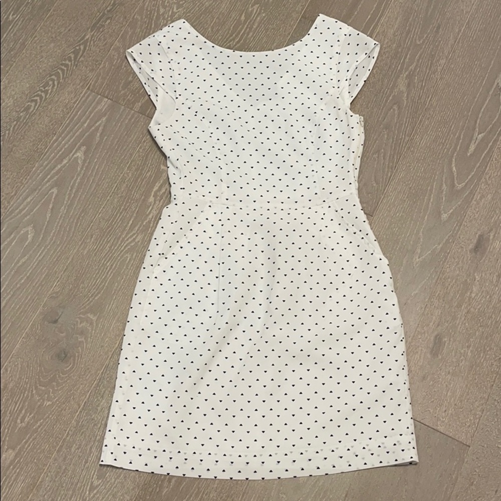 White dress with a black pattern